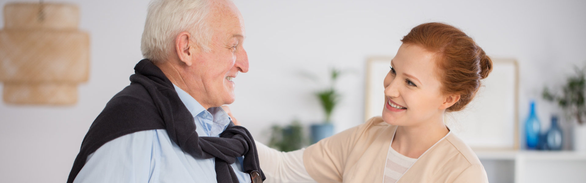 Caregiver and senior happy