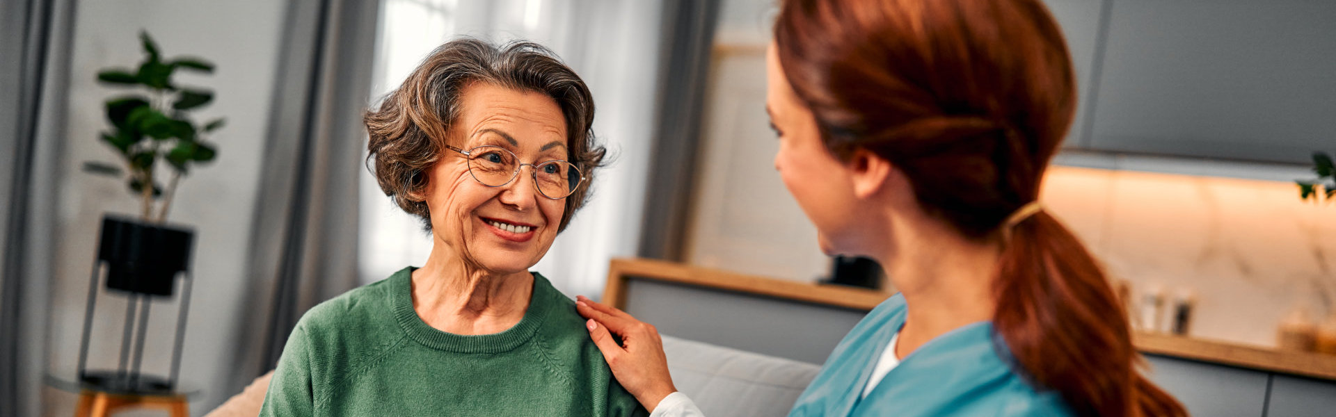 Nurse talking to senior
