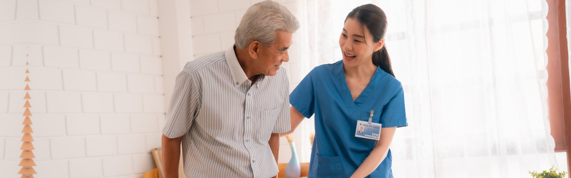 nurse assisting elder